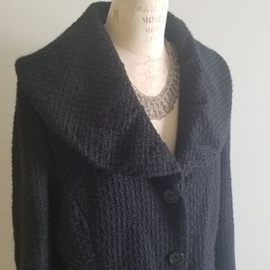 Black knee length overcoat with oversized statement shawl collar